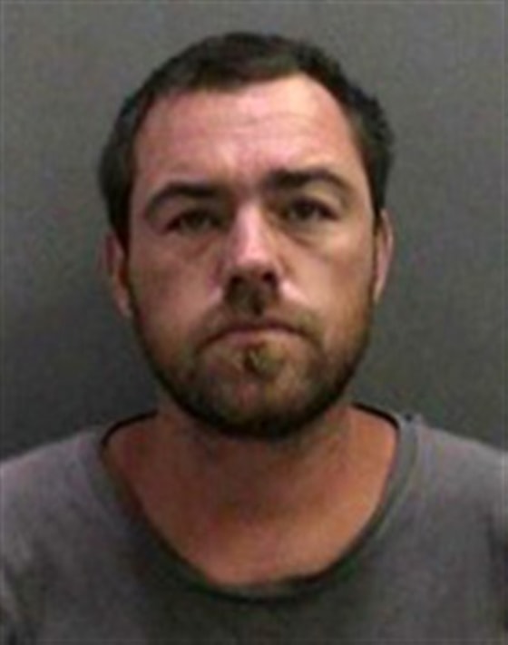Booking photo of Sloan Briles, 35, who was arrested Sunday for allegedly throwing his 7-year-old son overboard a Southern California sightseeing cruise during an argument.